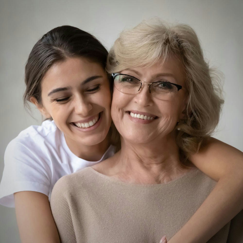 Smiling grandmother and daughter