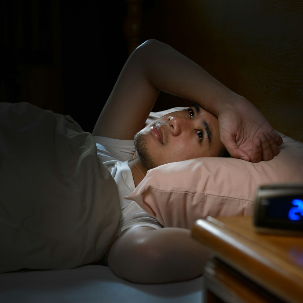 Man with sleep apnea having trouble sleeping